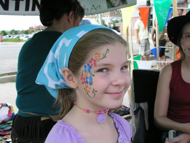augcharlottewithherfacepaintedatthebuskercarnival.jpg